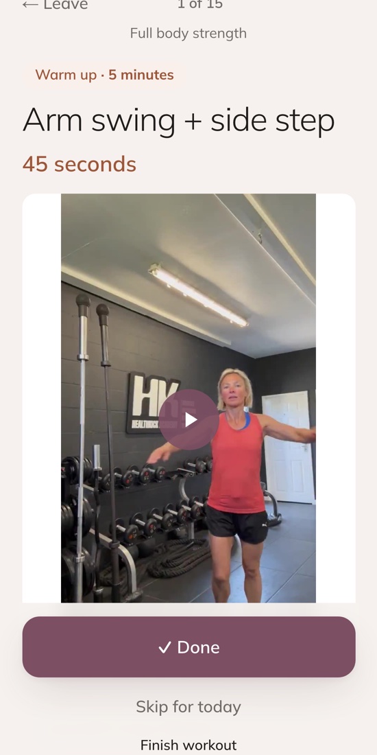 The workout player: arm swing and side step, with the coach's own video and a Done button